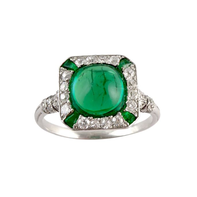 Art Deco cabochon emerald and diamond cluster ring, c.1920, the Colombian emerald of approximately 2.50ct, cushion shaped outline and domed finish, | MasterArt